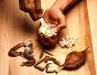 Photo depicting step seven of cracking into a crab.