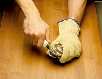 Photo depicting step three of bisecting an oyster.