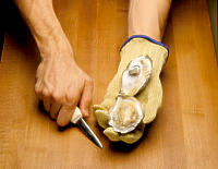 Photo depicting step six of bisecting an oyster.
